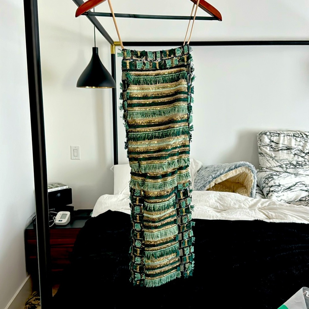 Green mini dress with sequence